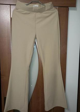 Штани кльош в рубчик l-xl
