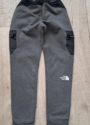 Спортивные штаны на мальчика 10-11р the north face