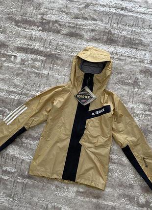 Жіноча легка курточка adidas terrex gore tex вітровка waterproof оригінальна з капюшоном весняна регульовані рукави