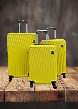 Комплект валіз fly 2062 на 4 колесах 3 в 1 (l, m, s) жовтий