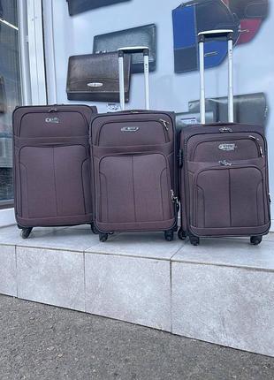 Набор тканевых чемоданов fly 8303-4 на 4-х колесах 3 штуки