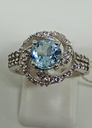 Серебряная кольца с топазами и фианитами.вес 4,34.цена 1935 грн.