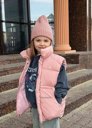 Рожева безрукавка жилетка для дівчинки на замочку тепла осіння