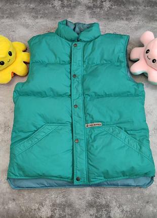 Пухова двостороння жилетка jack wolfskin 90s