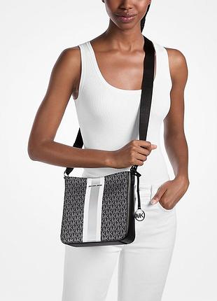 Жіноча сумка кросбоді jet set travel michael kors на блискавці