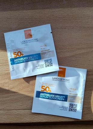 Солнцезащитная сыворотка с тоном и антиоксидантами для кожи spf50+