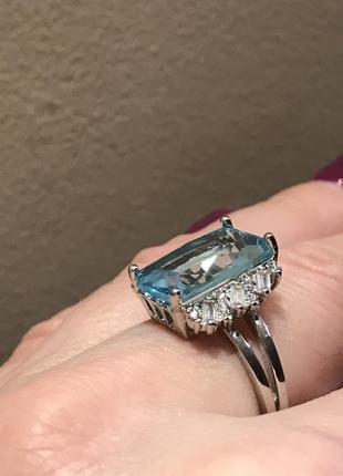 Серебряное кольцо с большим голубым лабораторным аквамарином6 фото