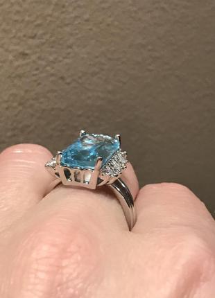 Серебряное кольцо с большим голубым лабораторным аквамарином8 фото