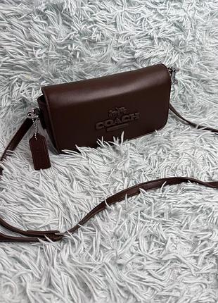 Сумка крос боді шоколадного кольору coach