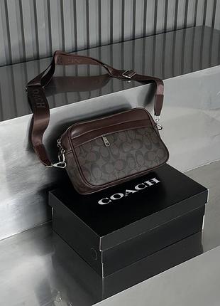 Мужская сумка кросс боди graham crossbody coach коричневый е.
