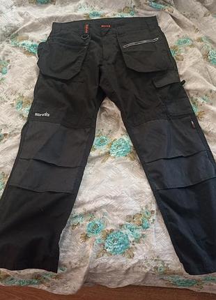 Штани робочі scruffs, розмір 38''r, чорні з навісними карманами, матеріал полікотон (65/35) тип ріп-стоп з наколінниками з міцного матеріалу abratect