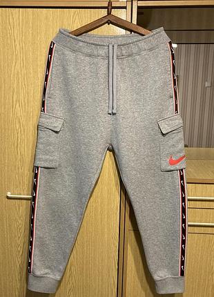 Спортивные штаны карго с лампасами nike sportswear repeat cargo pants.оригинал.