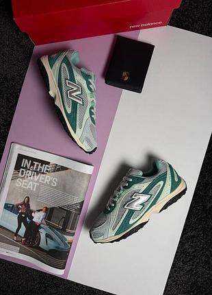 Жіночі кросівки new balance 204l grey green beige