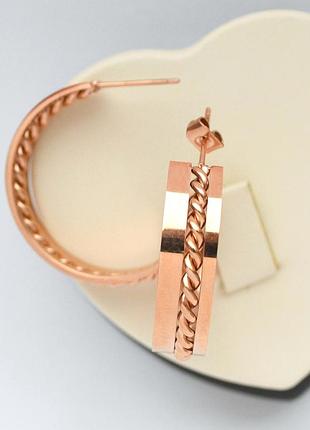 Серьги-гвоздики кольца xuping стальные 18к. диаметр 3 см.