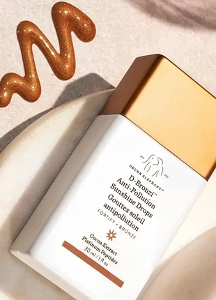 Бронзуючі краплі для обличчя drunk elephant d-bronzi anti-pollution sunshine drops (30 мл)