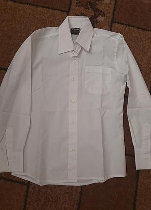 Сорочка для хлопчика, стан ідеальний, вік 8-9,  ріст 128см., 100% cotton класичний крой. чудово підійде під джинси та брючки