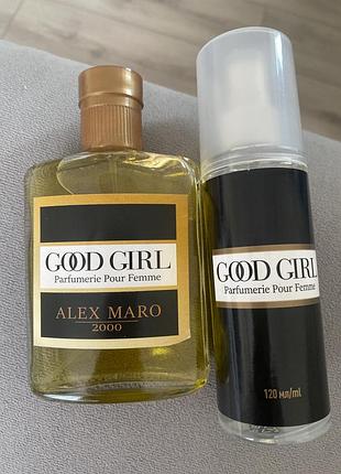 Представлена жіноча туалетна вода (або одеколон) alex maro good girl об'ємом 100 мл у прямокутному скляному флаконі із золотистим вмістом.