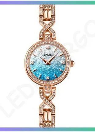 Женские часы skmei 2001bu blue кварцевые водонепроницаемые с золотистым корпусом и ремешком 20 см sku_aber_1080-2425