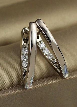 Сережки xuping jewelry стрілки з камінням ззаду 2 см сріблясті