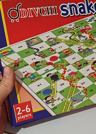 Настольная игра «змеи и лестницы» (snakes and ladders). это традиционная игра-ходилка, которая отлично подходит для всей семьи.