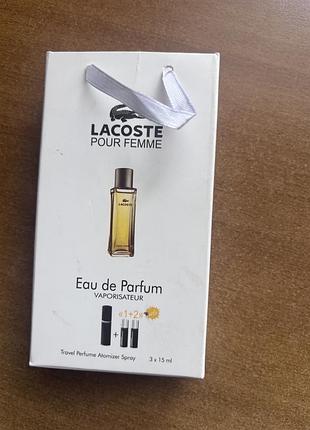 Парфумована вода lacoste pour femme у форматі з атомайзерами.