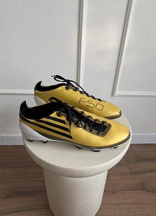 Футбольні бутси adidas f50 adizero в золотисто-чорному кольорі (лімітована серія, присвячена ліонелю мессі). uk11 28.5-29см