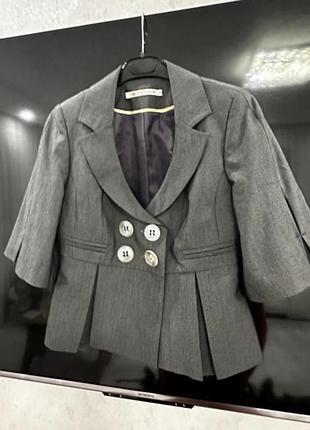 Костюм  з спідницею 38 або м