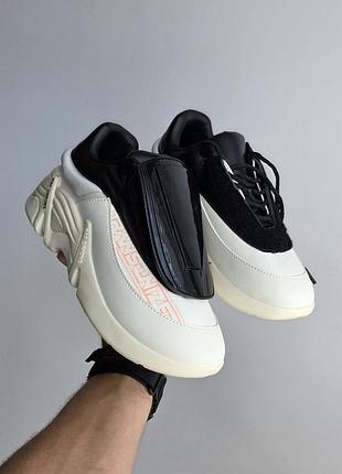 Raf simons antei 
• cream / black •