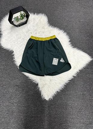 Чоловічі спортивні шорти бренду adidas, а саме модель adidas designed for training running shorts (артикул моделі: hl8822).