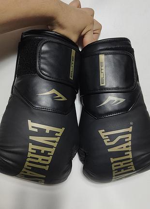 Боксерские перчатки everlast elite 2 boxing gloves (p00003273) унисекс 10 унций черно-золотые мужественные перчатки эверласт lonsdale