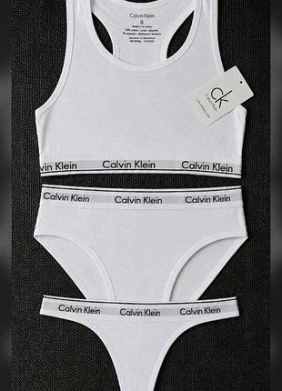 Комплект тройка женского белья calvin klein тройка: топ + двое трусов черного цвета