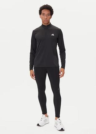 Легінси own the run winterized чорний slim fit
