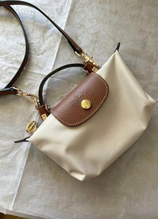Сумка жіноча longchamp  молочного кольору