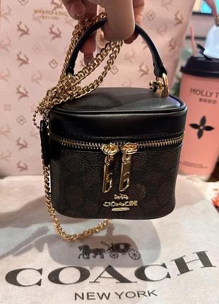 Сумочка бочонок coach коричнева на цепочці