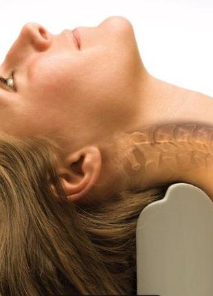 Ортопедичний валик denneroll cervical orthotic, який використовується для корекції шийного відділу хребта