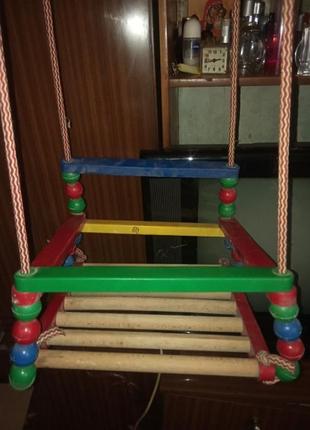Подвесная детская качеля.