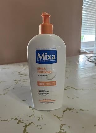 Живильне молочко з маслом ши mixa , використала не багато , можливо навітт менше ніж позначено на упаковці