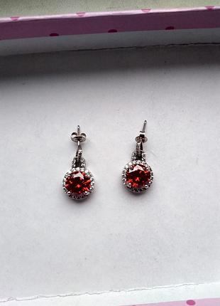Серьги подвески из серебра с красными цирконами