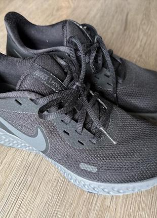 Чорні бігові кросівки nike revolution 5