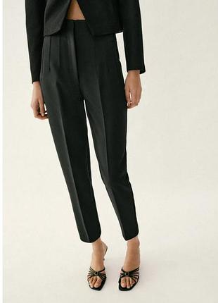 Черные брюки брючины zara. размер м.