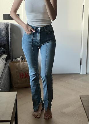 Джинси zara 32 розмір з розрізами знизу