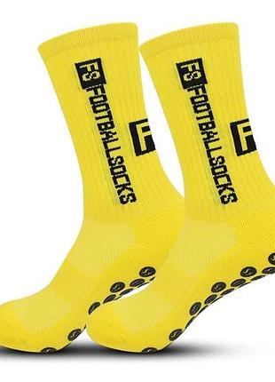 Жовті спортивні шкарпетки fs footballsocks з антиковзним покриттям.