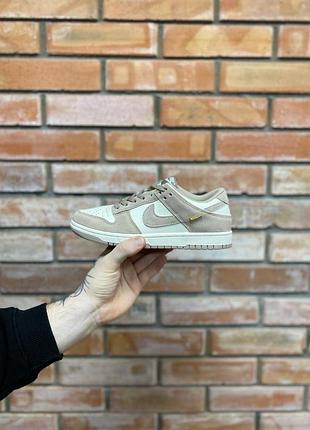 Nike dunk low sail beige metallic gold