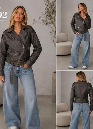 Стильна жіноча косуха з екошкіри в oversize стилі