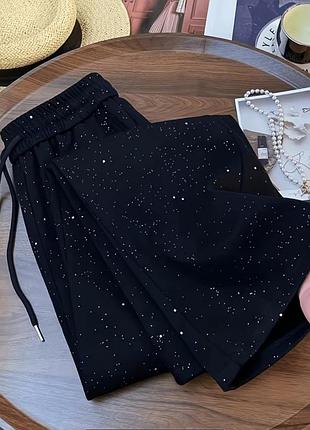 Блискучі жіночі штани ✨ блискуча балонова тканина 👖 чорні джогери зі сріблястим напиленням 🌟 штани з кишенями 🎯 тренд сезону