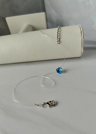 Кольє-невидимка на волосіні з блакитним камінчиком, витончений жіночий чокер з кристалом на шию, код 7033
