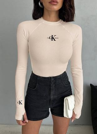 Жіночий лонгслів calvin klein бежевий