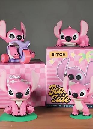 Інтерактивна фігурка стіч колекційна іграшка сюрприз stitch fun з рухомими елементами в коробці рожевий