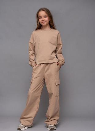 Спортивний костюм бежевого кольору. 140 та 146 см. hart.