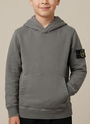 Подростковое детское худи stone island junior серого графитового цвета с фирменным съемным патчем-компасом на левом рукаве, оригинал.